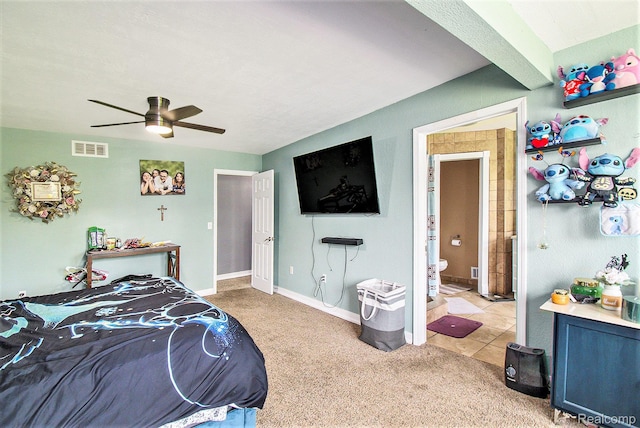7471 Brewer Rd, Flint, MI 48507 - carpeted bedroom with ceiling fan and ensuite bath