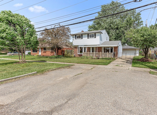 771 S Venoy Rd, Westland, MI 48186 - traditional-style house with brick siding, covered porch, an outbuilding, and a garage
