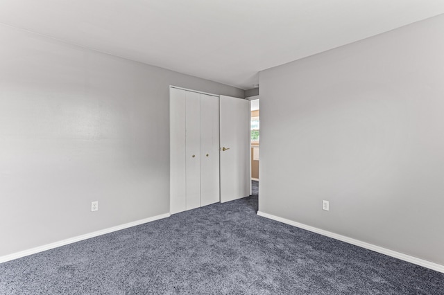 771 S Venoy Rd, Westland, MI 48186 - unfurnished bedroom with dark colored carpet and a closet