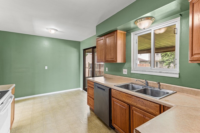 771 S Venoy Rd, Westland, MI 48186 - kitchen with stainless steel dishwasher, white electric range, light countertops, and brown cabinets