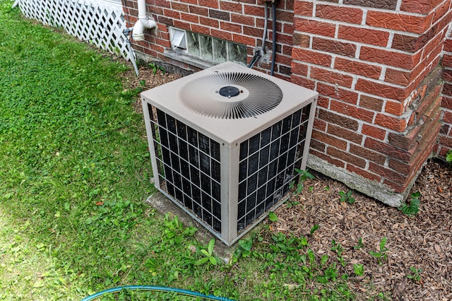 771 S Venoy Rd, Westland, MI 48186 - exterior view of a central AC unit and brick siding