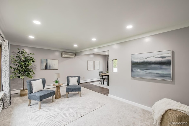 4290 Frostwood, Troy, MI 48098 - living area featuring a wall unit AC, a baseboard heating unit, recessed lighting, and carpet floors