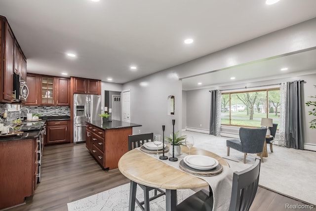 4290 Frostwood, Troy, MI 48098 - dining space with a baseboard heating unit, dark wood finished floors, and recessed lighting