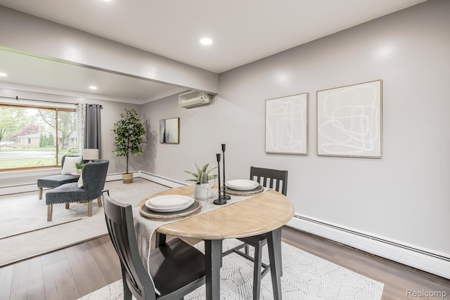4290 Frostwood, Troy, MI 48098 - dining room featuring a baseboard radiator, an AC wall unit, recessed lighting, and light wood-style floors