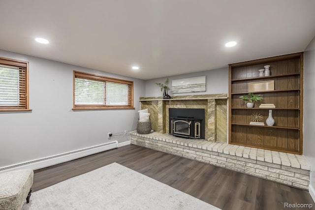 4290 Frostwood, Troy, MI 48098 - unfurnished living room featuring a baseboard heating unit, wood finished floors, and recessed lighting