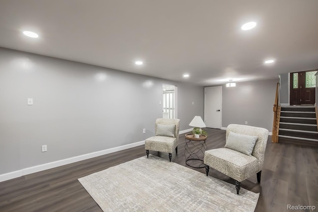 4290 Frostwood, Troy, MI 48098 - living area featuring dark wood-style flooring, recessed lighting, and stairway