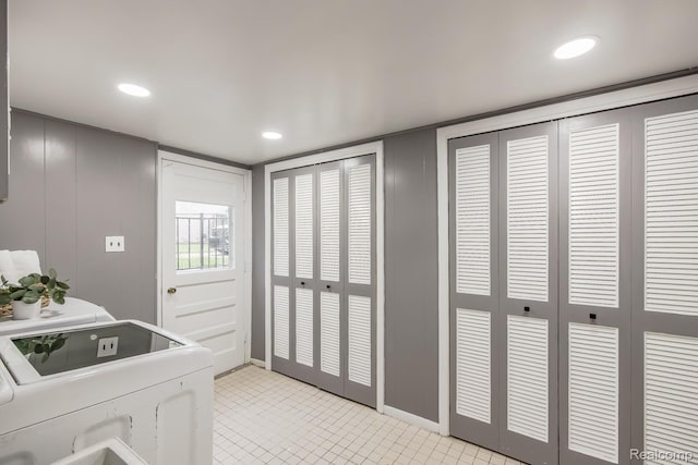 4290 Frostwood, Troy, MI 48098 - washroom featuring a decorative wall and light tile patterned floors