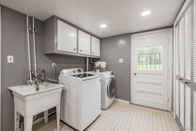 4290 Frostwood, Troy, MI 48098 - washroom featuring cabinet space, washing machine and clothes dryer, recessed lighting, and light tile patterned flooring