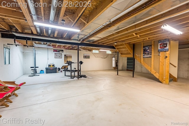 8123 Baypointe Dr, Brighton, MI 48114 - unfinished basement with stairway and strapped water heater