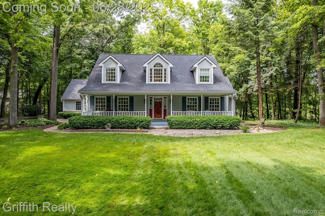 8123 Baypointe Dr, Brighton, MI 48114 - cape cod home with a front yard, covered porch, and roof with shingles