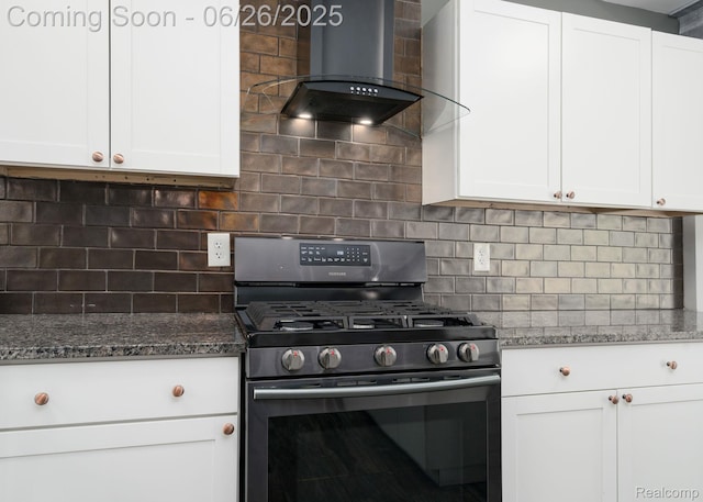2905 Lahser Rd, Bloomfield Hills, MI 48304 - kitchen featuring stainless steel gas range oven, wall chimney exhaust hood, white cabinetry, and dark stone counters