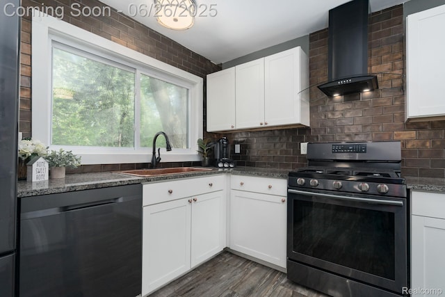 2905 Lahser Rd, Bloomfield Hills, MI 48304 - kitchen featuring black gas stove, wall chimney range hood, dishwashing machine, backsplash, and dark stone countertops