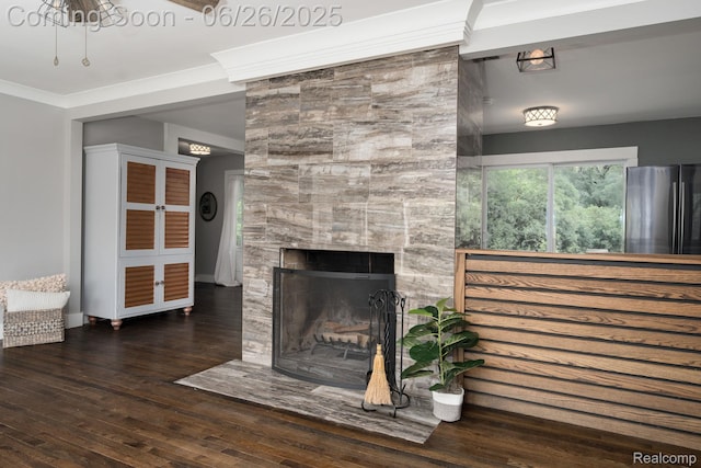 2905 Lahser Rd, Bloomfield Hills, MI 48304 - unfurnished living room featuring wood finished floors, a fireplace, and crown molding