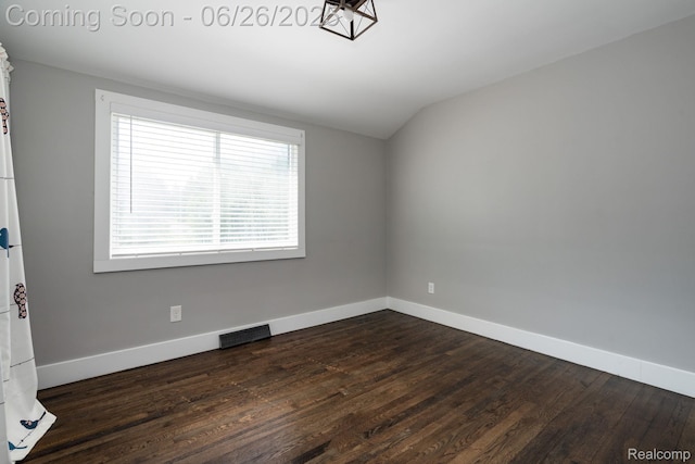 2905 Lahser Rd, Bloomfield Hills, MI 48304 - spare room featuring dark wood finished floors and vaulted ceiling