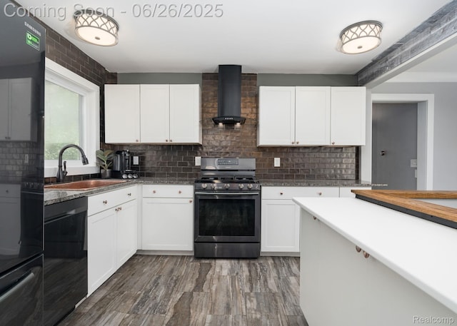 2905 Lahser Rd, Bloomfield Hills, MI 48304 - kitchen with stainless steel gas range, wall chimney range hood, dishwashing machine, backsplash, and white cabinetry