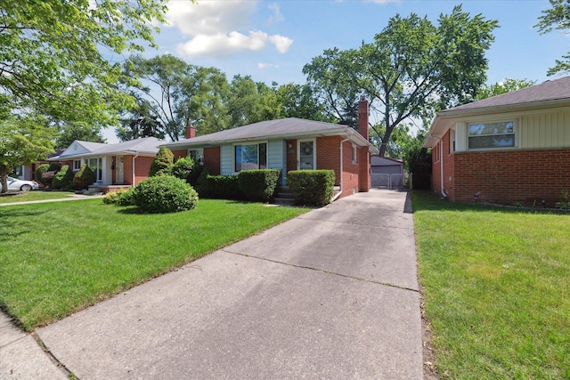 13210 Tecumseh Ave, Redford, MI 48239 - view of front of house with a chimney, brick siding, a front yard, and an outbuilding