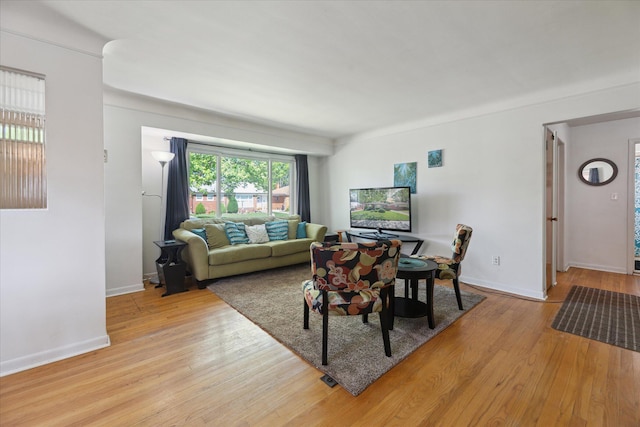 13210 Tecumseh Ave, Redford, MI 48239 - living area with wood finished floors and baseboards