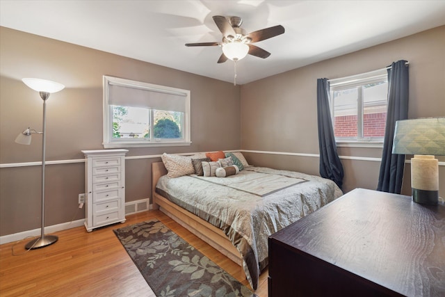 13210 Tecumseh Ave, Redford, MI 48239 - bedroom featuring light wood-type flooring and a ceiling fan