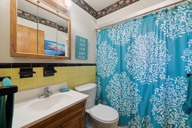 13210 Tecumseh Ave, Redford, MI 48239 - bathroom featuring vanity, tile walls, a wainscoted wall, and a shower with curtain