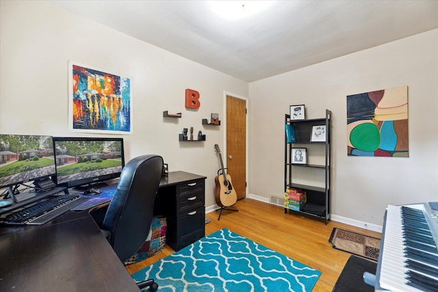 13210 Tecumseh Ave, Redford, MI 48239 - office area with light wood finished floors and baseboards