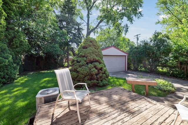 13210 Tecumseh Ave, Redford, MI 48239 - deck with an outdoor structure, a garage, and view of wooded area