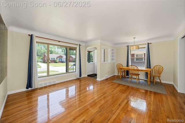 17381 Lennane, Redford, MI 48240 - dining room featuring arched walkways and wood finished floors
