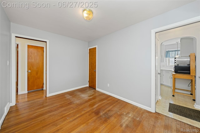 17381 Lennane, Redford, MI 48240 - unfurnished bedroom with hardwood / wood-style floors and arched walkways