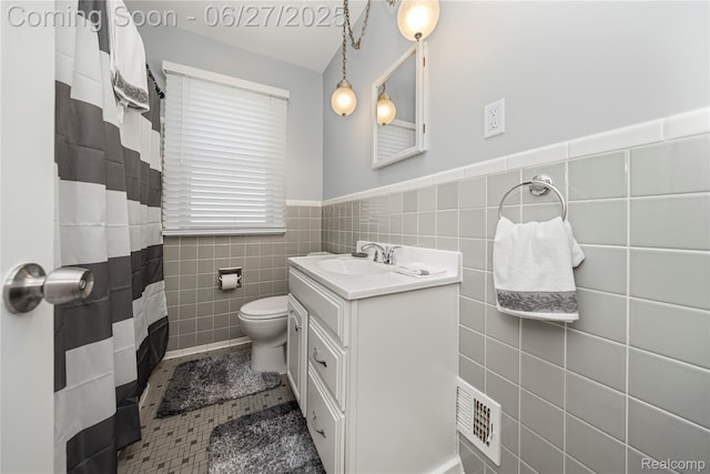 17381 Lennane, Redford, MI 48240 - full bath featuring tile walls, vanity, tile patterned flooring, a wainscoted wall, and curtained shower