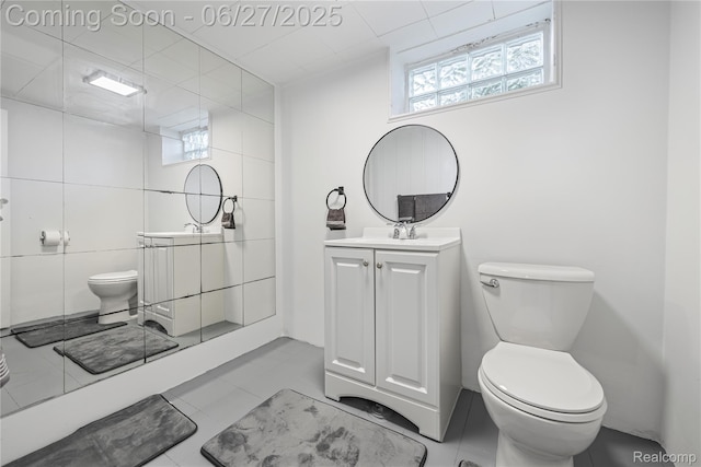 17381 Lennane, Redford, MI 48240 - bathroom featuring vanity, tile patterned floors, and tile walls