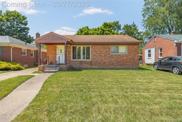 17381 Lennane, Redford, MI 48240 - view of front of property with brick siding and a front yard