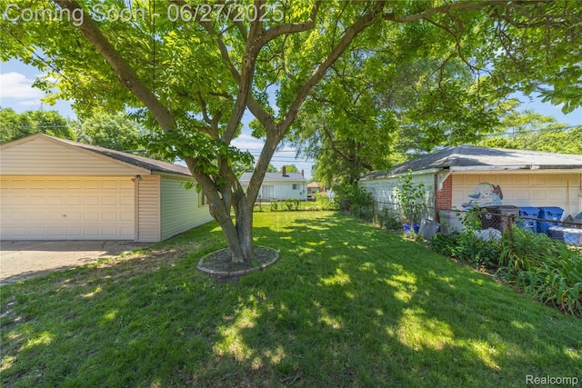 17381 Lennane, Redford, MI 48240 - view of yard featuring a detached garage and an outbuilding