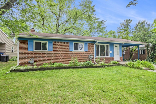 1621 Whittier Rd, Ypsilanti, MI 48197 - view of front of property with brick siding, a front lawn, a chimney, and an attached carport