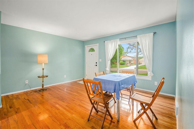 1621 Whittier Rd, Ypsilanti, MI 48197 - dining area with baseboards and wood finished floors