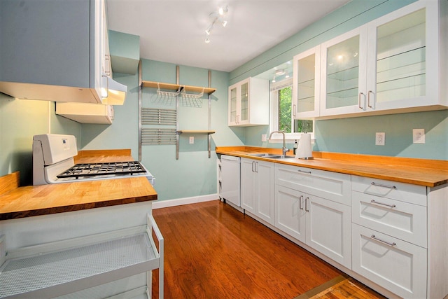 1621 Whittier Rd, Ypsilanti, MI 48197 - kitchen with wood counters, white appliances, dark wood-type flooring, white cabinets, and glass insert cabinets
