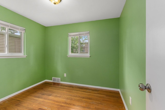 1621 Whittier Rd, Ypsilanti, MI 48197 - unfurnished room featuring baseboards and wood finished floors