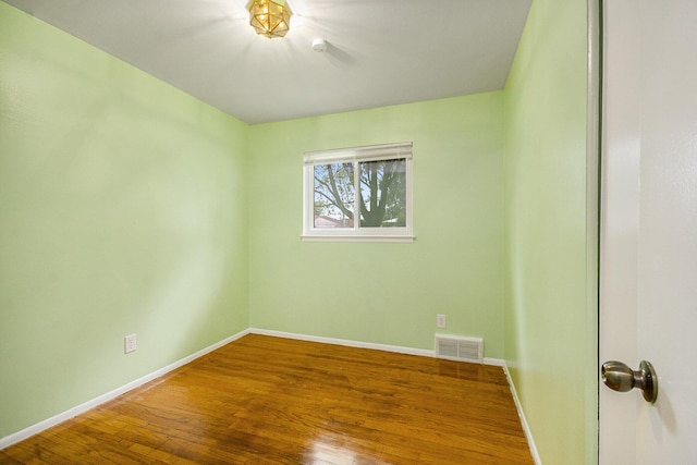 1621 Whittier Rd, Ypsilanti, MI 48197 - unfurnished room with baseboards and wood finished floors