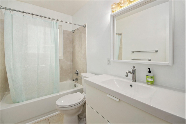1621 Whittier Rd, Ypsilanti, MI 48197 - bathroom with shower / bath combo, vanity, and tile patterned floors