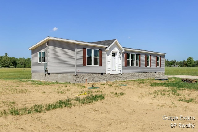 19150 Yankee Rd, Morley, MI 49336 - view of property exterior with crawl space