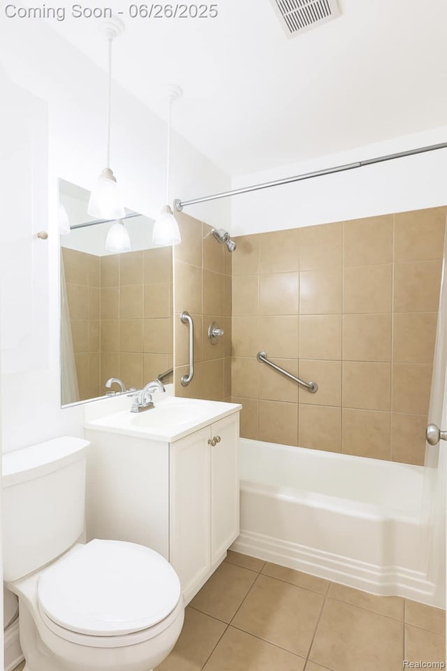 607 Chalmers St, Flint, MI 48503 - bathroom featuring vanity, tile patterned floors, and shower / washtub combination