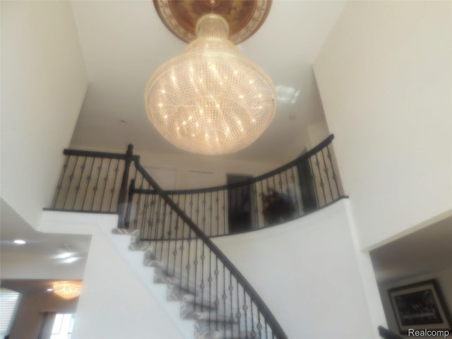 41431 Tarragon Dr, Sterling Heights, MI 48314 - stairway featuring a chandelier