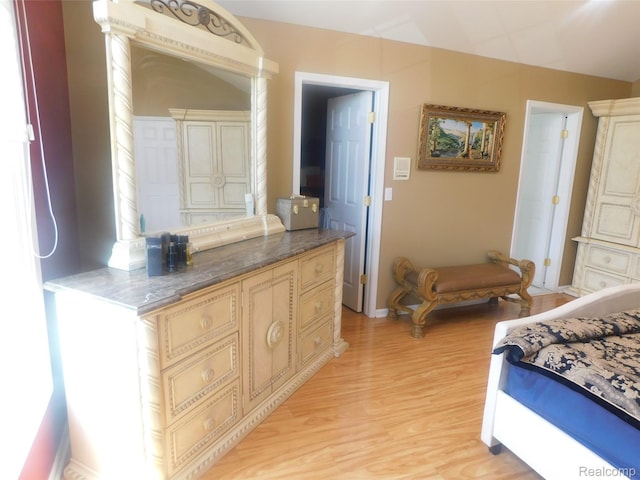 41431 Tarragon Dr, Sterling Heights, MI 48314 - bedroom with light wood-type flooring and baseboards