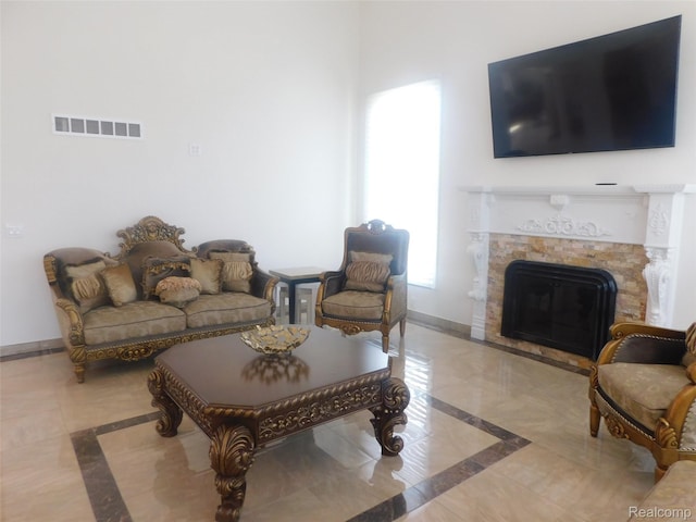 41431 Tarragon Dr, Sterling Heights, MI 48314 - living area featuring inlaid floor details and a fireplace