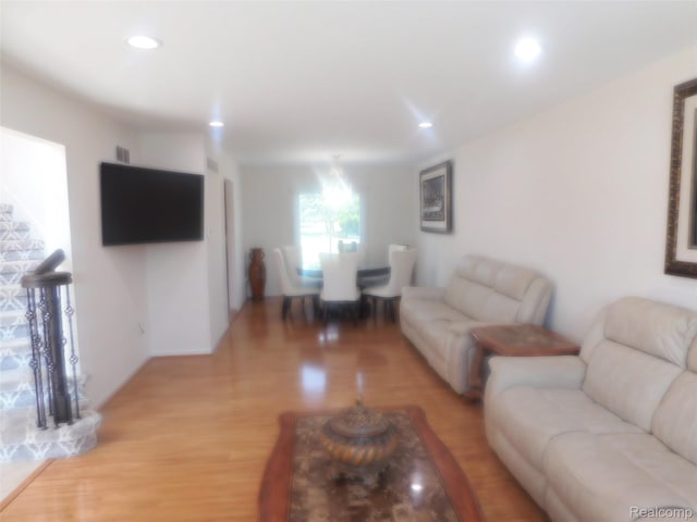 41431 Tarragon Dr, Sterling Heights, MI 48314 - living room with light wood-type flooring and recessed lighting