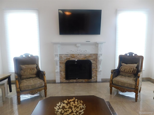 41431 Tarragon Dr, Sterling Heights, MI 48314 - living area with a fireplace and healthy amount of natural light