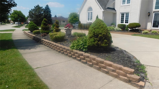 41431 Tarragon Dr, Sterling Heights, MI 48314 - view of home's exterior featuring brick siding
