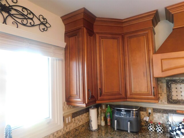 41431 Tarragon Dr, Sterling Heights, MI 48314 - kitchen featuring brown cabinets and decorative backsplash