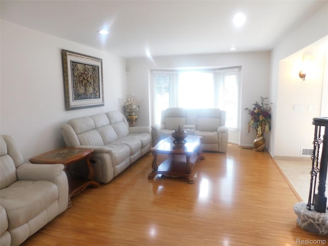 41431 Tarragon Dr, Sterling Heights, MI 48314 - living area with light wood finished floors and recessed lighting