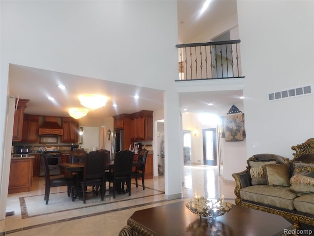 41431 Tarragon Dr, Sterling Heights, MI 48314 - living room featuring a towering ceiling