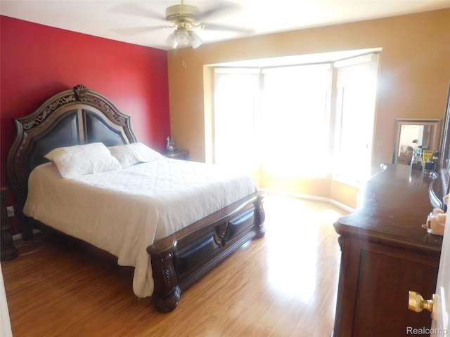 41431 Tarragon Dr, Sterling Heights, MI 48314 - bedroom with light wood finished floors and ceiling fan
