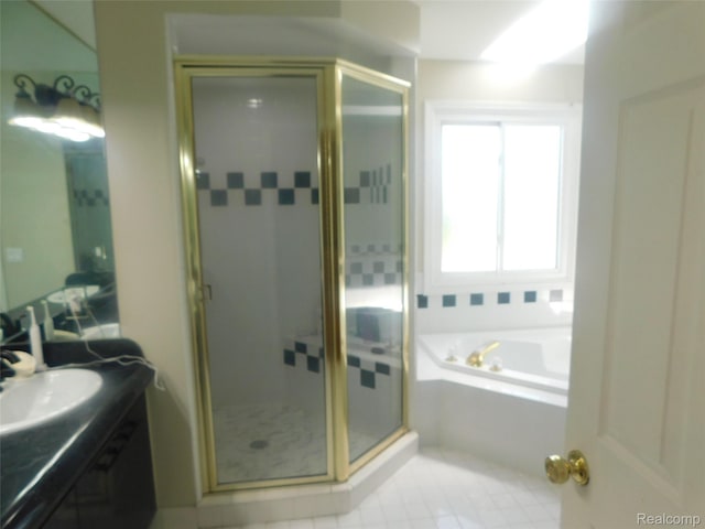 41431 Tarragon Dr, Sterling Heights, MI 48314 - bathroom featuring a shower stall, vanity, a garden tub, and tile patterned flooring